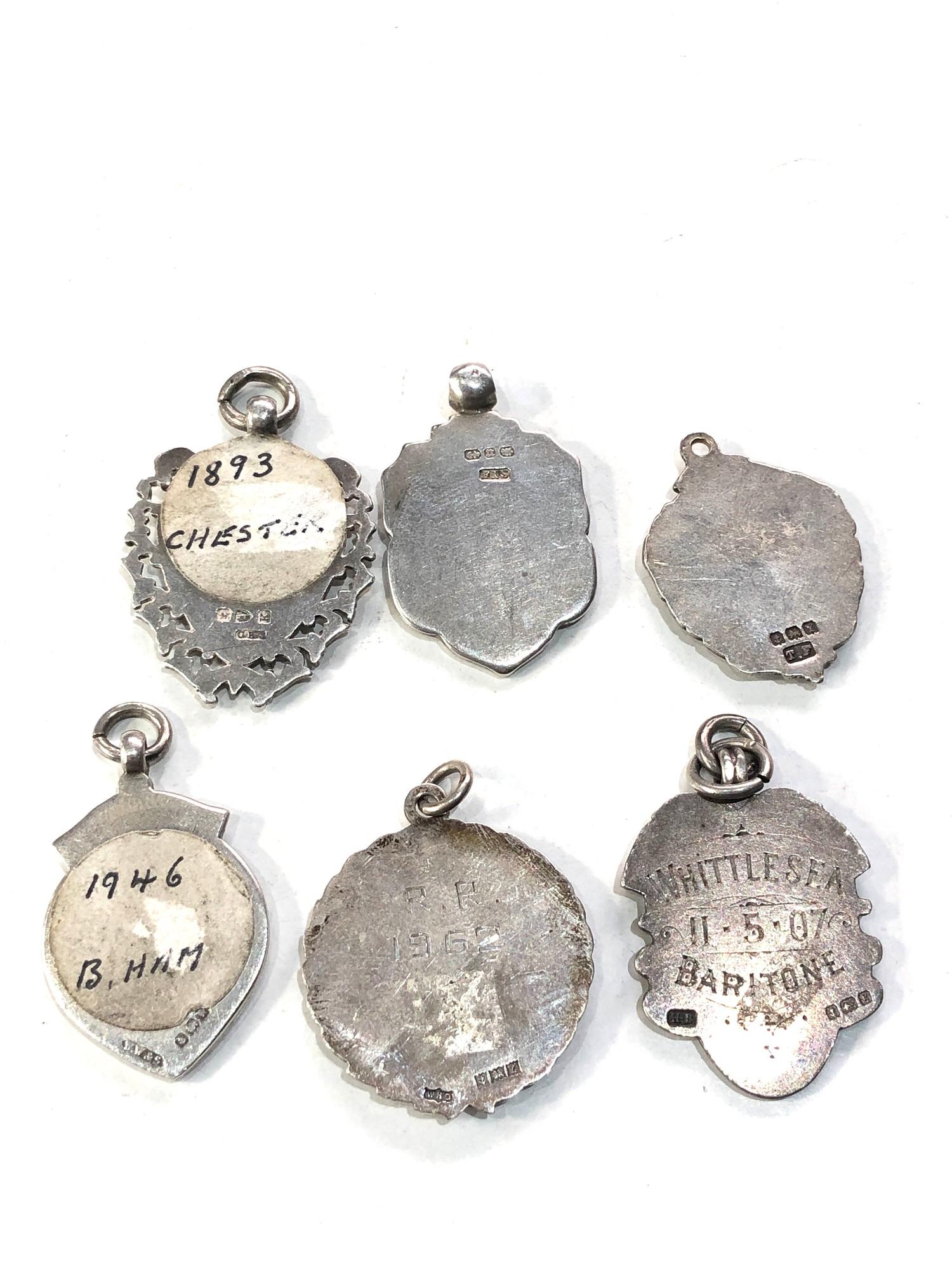 Selection of antique silver pocket watch chain fobs - Image 2 of 2