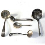 Selection of silver items include antique tea caddy spoon shifter spoons etc total weight 110g