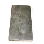 Large heavy engine turned cigarette case dog motif measures approx 15cm by 8cm weight 250g