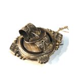 Victorian gold mourning buckle locket with hair measures approx 4.4cm by 3.6cm weight 10.8g