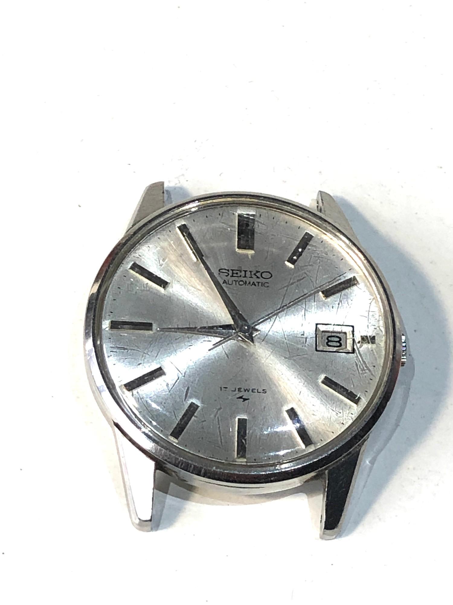 Vintage Seiko Automatic 17 Jewels Date Calibre 7005-2000 watch is ticking case measures approx