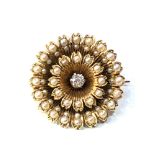 Antique gold diamond and seed-pearl brooch central diamond meausres approx 3mm dia with seed-