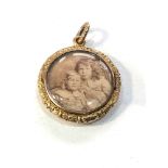 Antique gold picture locket measures approx 3.5cm drop by 2.6cm weight 8g