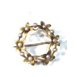 Antique 15ct gold seedpearl petal brooch measures approx 2.5cm dia weight 2.5g hallmarked 15ct in