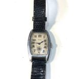Early Tell gents wristwatch the watch is ticking but no warranty is given case worn as shown