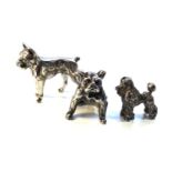 3 dutch silver dog figures all with dutch silver hallmarks largest measures approx 3.1cm by 2.4cm