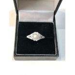 Fine platinum diamond and pearl ring central pearl with diamonds around .35ct