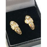 Fine 18ct gold diamond half hoop earrings each measures approx 1.7cm drop total weight 6.5g