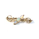 Antique gold opal and seed-pearl brooch set with 3 opals largest measures approx 7mm by 6mm brooch
