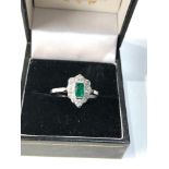 Fine Platinum diamond an emerald ring central emerald 0.90ct with diamonds around 0.50ct