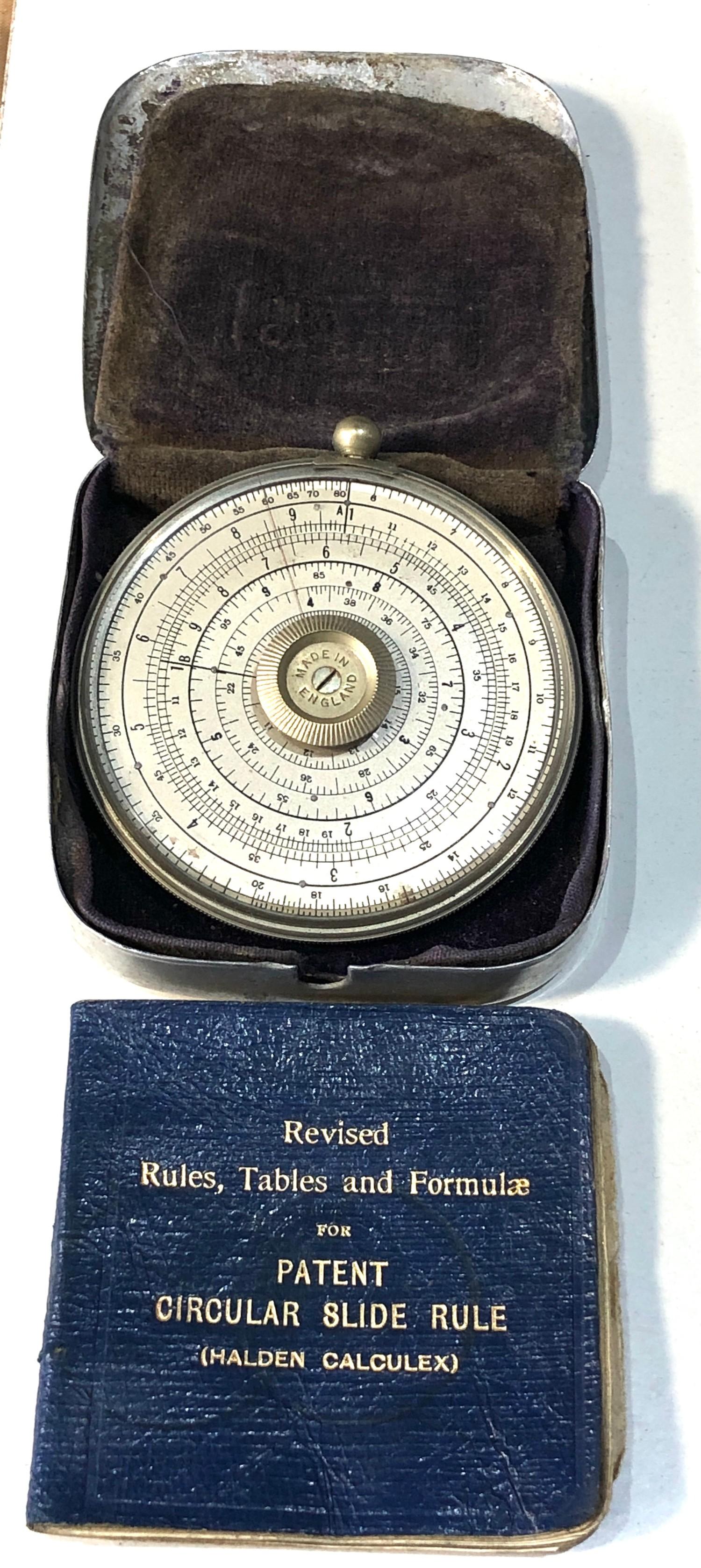 Vintage Halden Calculex circular slide rule & original metal case and booklet