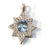 Fine Aquamarine and diamond star pendant measures approx 3.2mm drop by 2.2cm wide central aquamarine