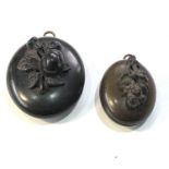 2 victorian bog oak lockets largest meaures approx 4.6cm by 3.9cm hinge in need of repair on largest