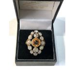 Fine quality 18ct gold Diamond and topaz ring central topaz measures approx 8mm dia 2.20ct with