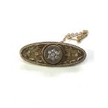 Victorian 15ct gold & diamond brooch measures approx 4.4cm by 1.6cm weight 7.6g