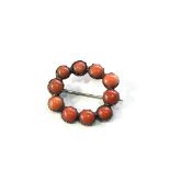 Small antique coral brooch gold back metal pin measures approx 2.2cm by 2.1cm