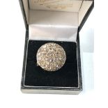 Large gold diamond ring round head set with diamonds all over est 1.20ct measures approx 2.1cm dia