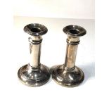 Pair of antique silver candlesticks Birmingham silver hallmarks height 11.5cm filled bases