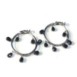 White gold black diamond drop earrings measure approx 2.7 by 2.5 cm dia each set with 7 dangly black