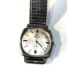 Vintage Delma of Switzerland automatic 25 jewel gents wristwatch the watch is ticking but no