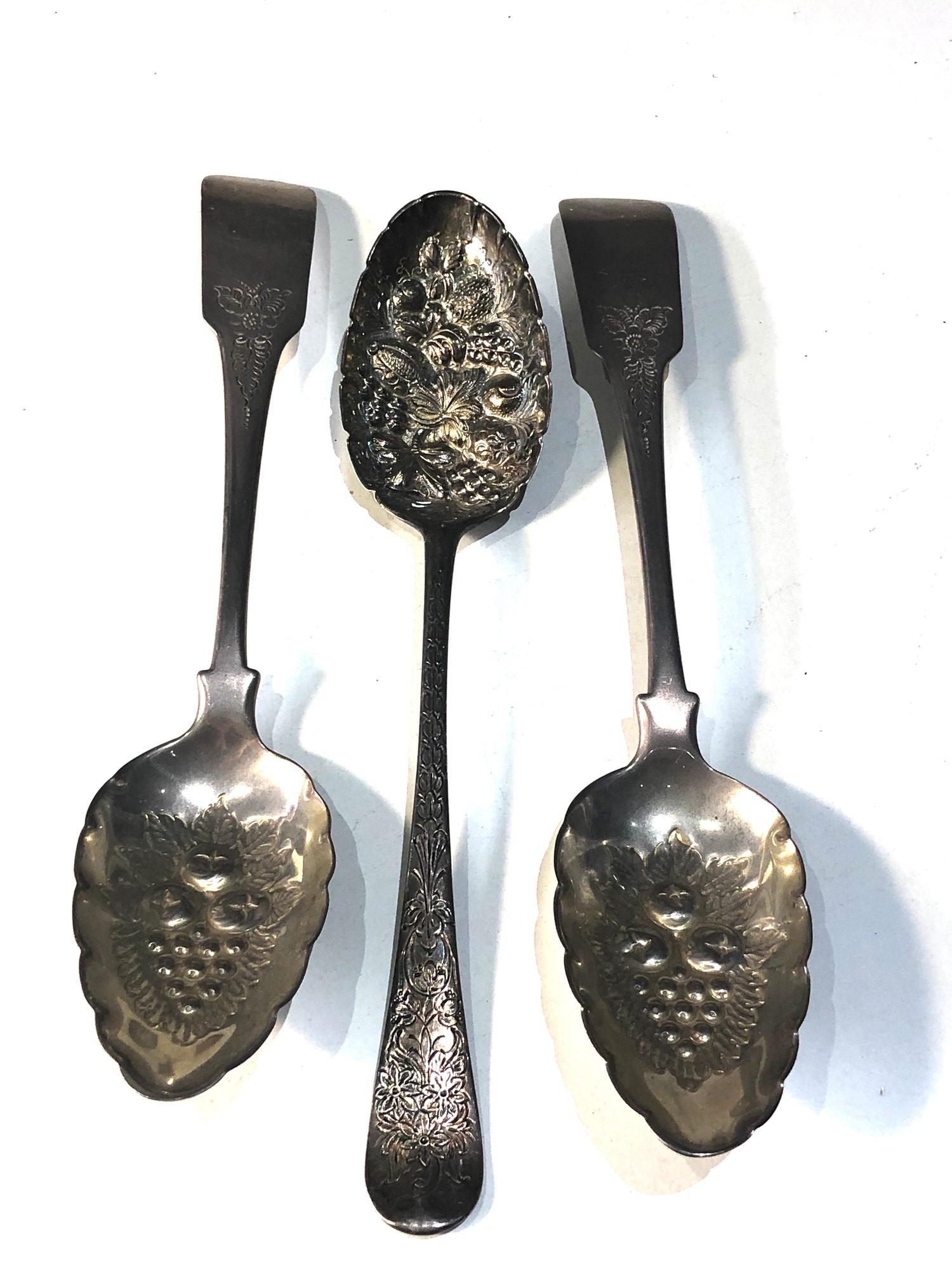 Pair of antique Irish silver berry spoons and and early London silver berry spoon pair measures