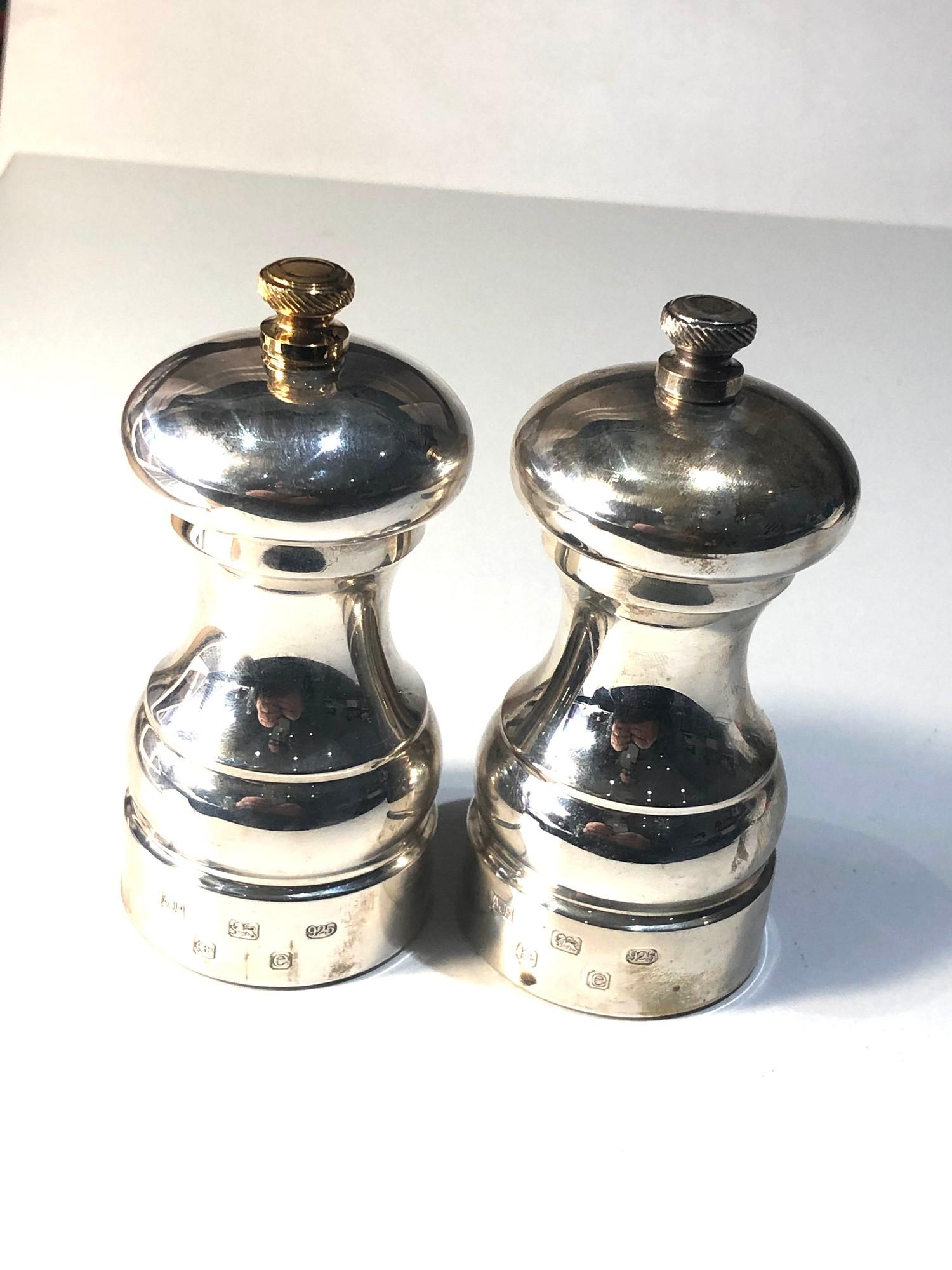 2 Large hallmarked silver salt and pepper grinders Birmingham silver hallmarks measure height 10.5cm