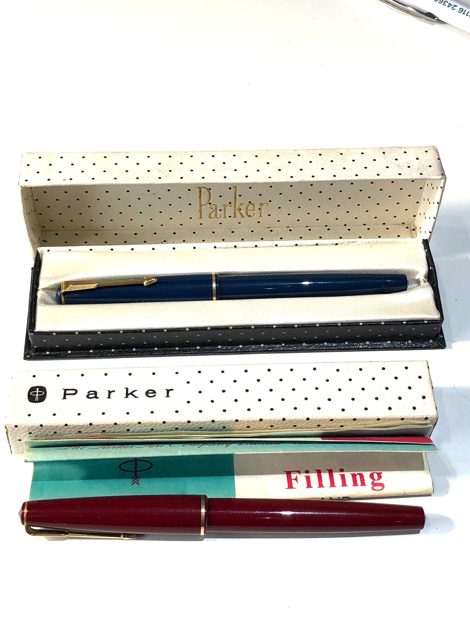 2 boxed vintage parker fountain pens