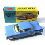 Corgi 220 Chevrolet Impala in original box good condition 1 flaps missing car in good near mint