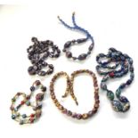 Selection of antique venetian foil and wedding cake etc bead necklaces