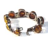 Vintage chunky silver and amber bracelet measures approx 18.5cm long by 2.3cm wide weight 52g