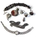 Selection of vintage silver jewellery includes ladies silver wristwatch chains brooch and rings