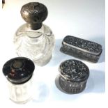 Selection of 4 silver top bottles includes tortoiseshell top 2 trinket jars and a large silver