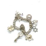 Silver charm bracelet and charms weight 30g