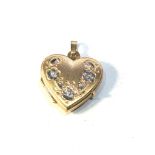 Small 9ct gold heart locket measures approx 2.5cm drop by 1.9cm wid weight 2g in good condition