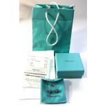 Pair of Tiffany silver twist wire knot earring complete with purchase receipt box and bag