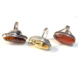 3 large vintage silver and amber rings