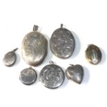 Selection of vintage silver lockets largest measures approx 6cm drop by 3.3cm wide