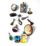 Selection of vintage silver jewellery includes cameos pendants etc