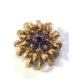 14ct gold flower amethyst brooch measures approx 3.2cm dia weight 11g