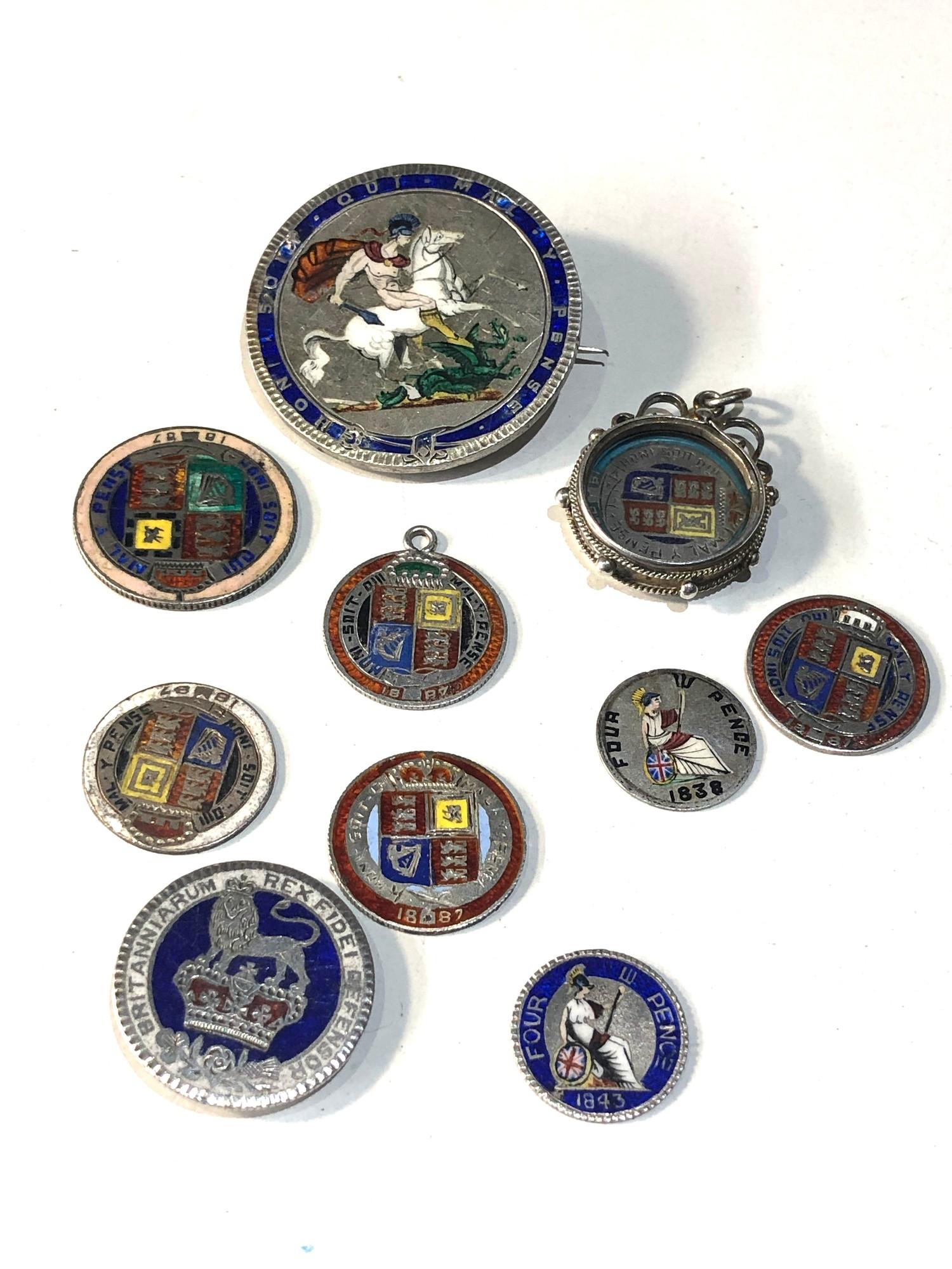 Selection of antique enamelled silver coins