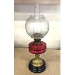 Antique cranberry glass oil lamp