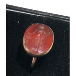 Antique intaglio seal possibly roman intaglio measures approx 13mm by 10mm set in gold mount