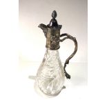 Large p cut glass and silver pated claret jug in good antique condition measures approx 13ins tall