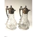 Large pair of cut glass and silver pated claret jugs in good antique condition each measures