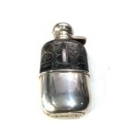 Antique silver and leather mounted hip flask measures approx 13cm by 6cm