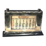 Antique silver framed calendar measures approx 21cm by 13cm