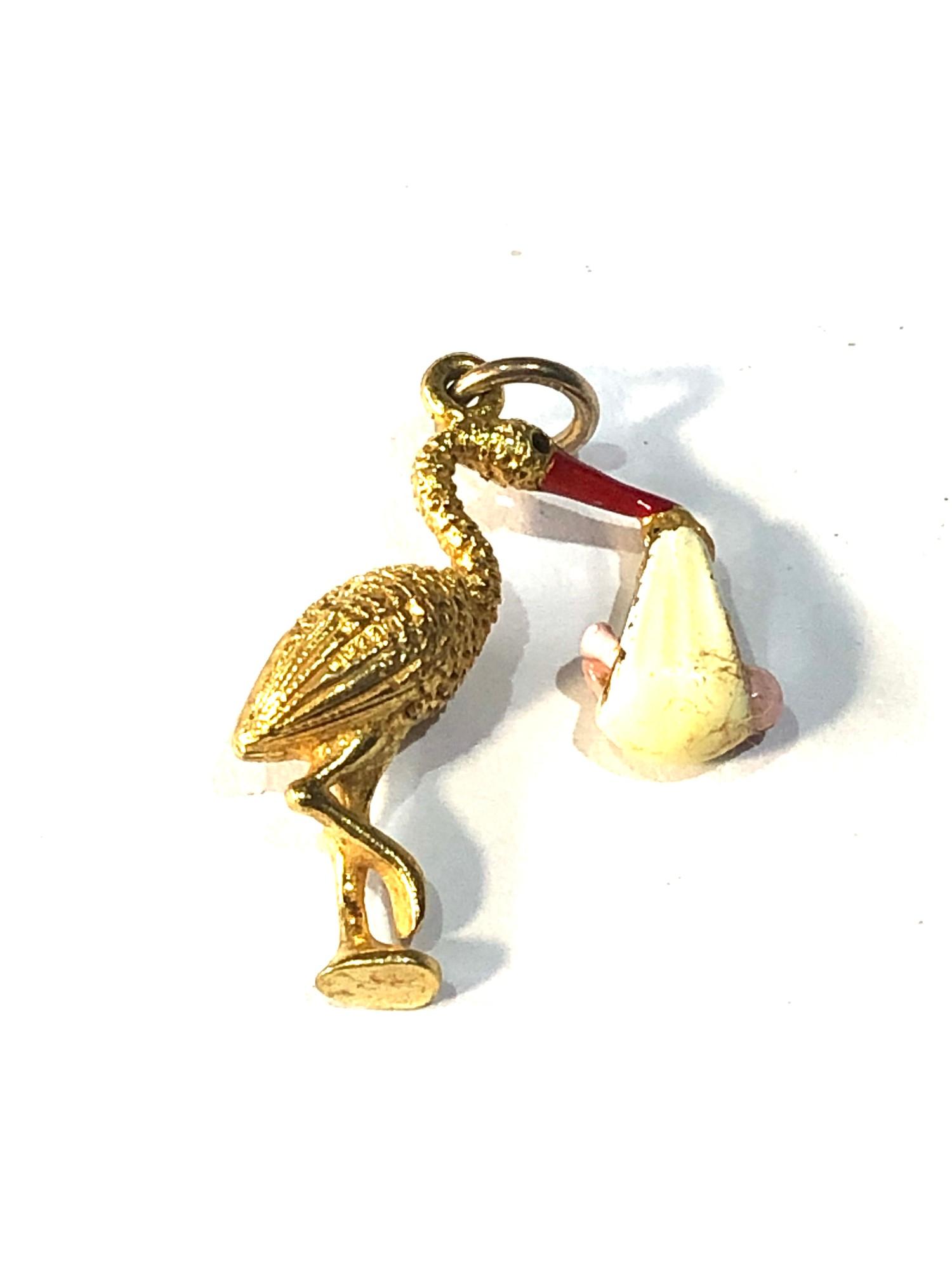 14ct gold enamel enamelled stork carrying baby charm (articulated) weight 2.9g