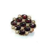 9ct gold garnet and seed-pearl brooch measures approx 2.8cm by 2.2cm weight 6.2g one pearl has
