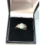 18ct gold diamond & opal ring opal measures approx 8mm by 7mm with diamonds either side weight 3.6g