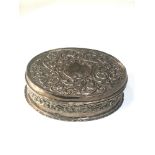 Silver embossed hinged lid oval box measures approx 16cm by 12cm height 5cm London silver